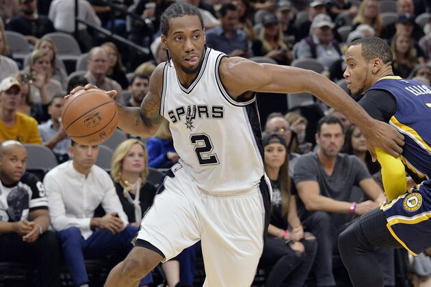 San Antonio Spurs forward Kawhi Leonard (2) drives around Indiana Pacers guard Monta Ellis during the first half of an NBA basketball game Monday, Dec. 21, 2015, in San Antonio. San Antonio won 106-92. (AP Photo/Darren Abate) San Antonio Spurs forward Kawhi Leonard (2) drives around Indiana Pacers guard Monta Ellis during the first half of an NBA basketball game Monday, Dec. 21, 2015, in San Antonio. San Antonio won 106-92. (AP Photo/Darren Abate)