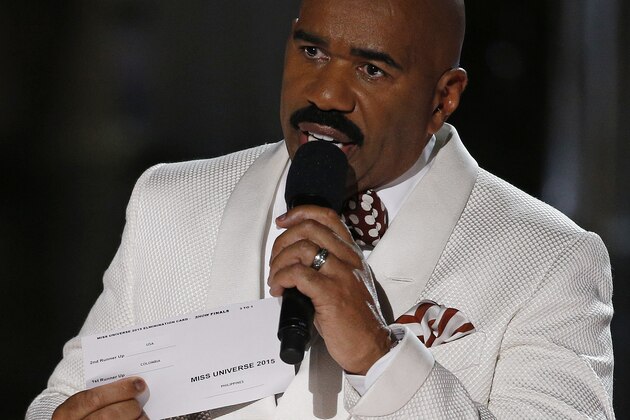 Steve Harvey holds up the card showing the winners after he incorrectly announced Miss Colombia Ariadna Gutierrez at the winner at the Miss Universe pageant Sunday, Dec. 20, 2015, in Las Vegas. According to the pageant, a misreading led the announcer to read Miss Colombia  as the winner before they took it away and gave it to Miss Philippines Pia Alonzo Wurtzbach.(AP Photo/John Locher)