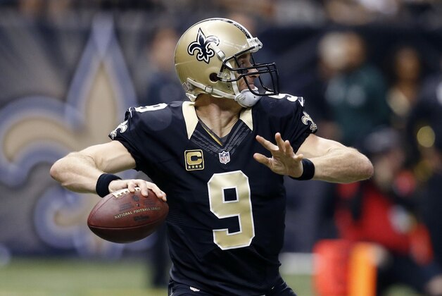 New Orleans Saints quarterback Drew Brees (9) drops back to pass in the first half of an NFL football game against the Detroit Lions in New Orleans, Monday, Dec. 21, 2015. (AP Photo/Jonathan Bachman)