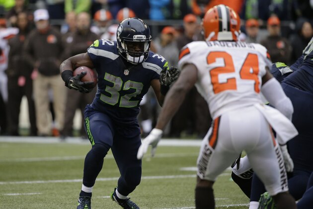 Seattle Seahawks' Christine Michael (32) carries against the Cleveland Browns in the first half of an NFL football game, Sunday, Dec. 20, 2015, in Seattle. (AP Photo/Ted S. Warren)