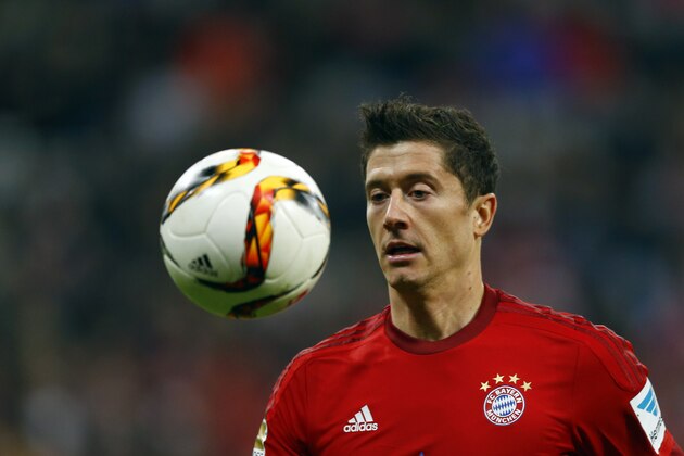 Bayern's Robert Lewandowski controls the ball during the German Bundesliga soccer match between FC Bayern Munich and FC Ingolstadt 04 at the Allianz Arena stadium in Munich, Germany, Saturday, Dec. 12, 2015. (AP Photo/Matthias Schrader)