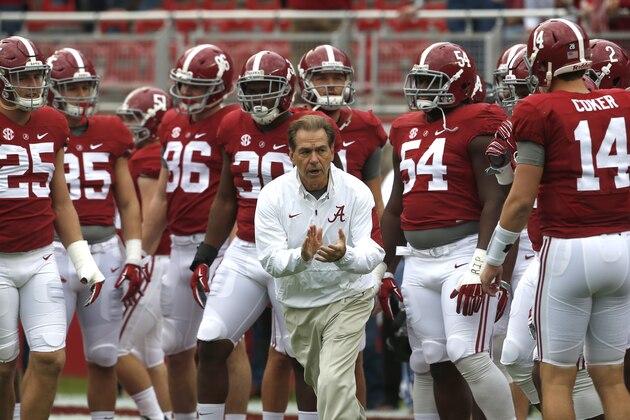 Alabama head coach Nick Saban leads the team onto the field for warmups in an NCAA football game, Saturday, Nov. 21, 2015, in Tuscaloosa, Ala. (AP Photo/Butch Dill)