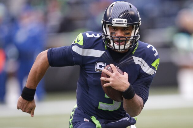Seattle Seahawks quarterback Russell Wilson scrambles in the first half of an NFL football game against the Cleveland Browns, Sunday, Dec. 20, 2015, in Seattle. (AP Photo/Scott Eklund)