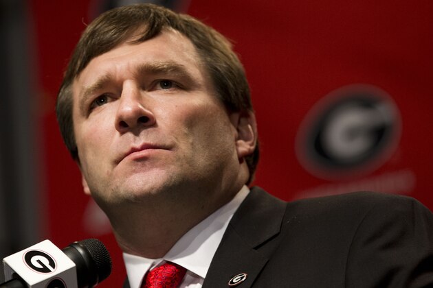 Alabama defensive coordinator Kirby Smart speaks during a press conference where he was introduced as Georgia's new NCAA college head football coach  Monday, Dec. 7, 2015, in Athens, Ga. Smart will continue in his current role as Alabama's defensive coordinator through the College Football Playoff as he also begins work as Georgia's coach. (AP Photo/John Bazemore)