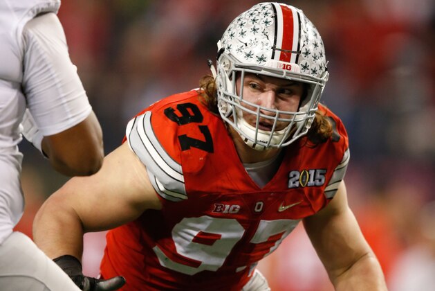 Jan 12, 2015; Arlington, TX, USA; Ohio State Buckeyes defensive lineman Joey Bosa (97) in game action against the Oregon Ducks in the 2015 CFP National Championship Game at AT&T Stadium. Ohio State won 42-20. Mandatory Credit: Tim Heitman-USA TODAY Sports