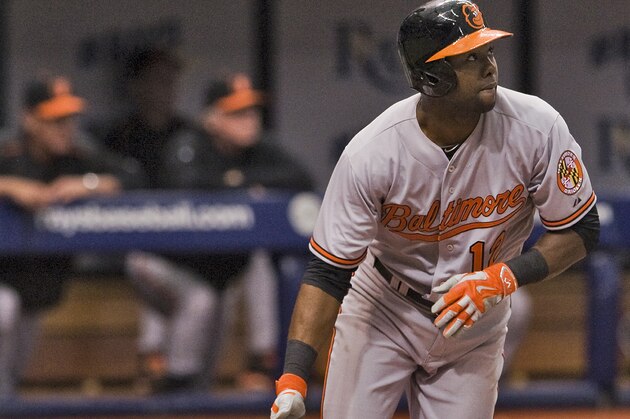 Baltimore Orioles' Alejandro De Aza hits a two-run homer against the Tampa Bay Rays during the their opening day baseball game Monday, April 6, 2015 in St. Petersburg, Fla. (AP Photo/Steve Nesius)