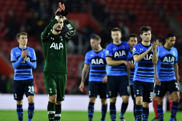 Tottenham Hotspur's French goalkeeper Hugo Lloris (2nd L) celebrates on the pitch with his team after the English Premier League football match between Southampton and Tottenham Hotspur at St Mary's Stadium in Southampton, southern England on December 19, 2015. Tottenham won the game 2-0. AFP PHOTO / BEN STANSALL

RESTRICTED TO EDITORIAL USE. NO USE WITH UNAUTHORIZED AUDIO, VIDEO, DATA, FIXTURE LISTS, CLUB/LEAGUE LOGOS OR 'LIVE' SERVICES. ONLINE IN-MATCH USE LIMITED TO 75 IMAGES, NO VIDEO EMULATION. NO USE IN BETTING, GAMES OR SINGLE CLUB/LEAGUE/PLAYER PUBLICATIONS. / AFP / BEN STANSALL        (Photo credit should read BEN STANSALL/AFP/Getty Images)