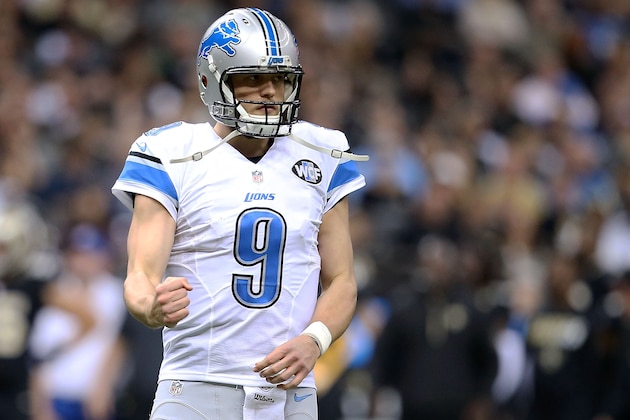 NEW ORLEANS, LA - DECEMBER 21:  Matthew Stafford #9 of the Detroit Lions reacts to a touchdown during the second quarter of a game against the New Orleans Saints at the Mercedes-Benz Superdome on December 21, 2015 in New Orleans, Louisiana.  (Photo by Sean Gardner/Getty Images)