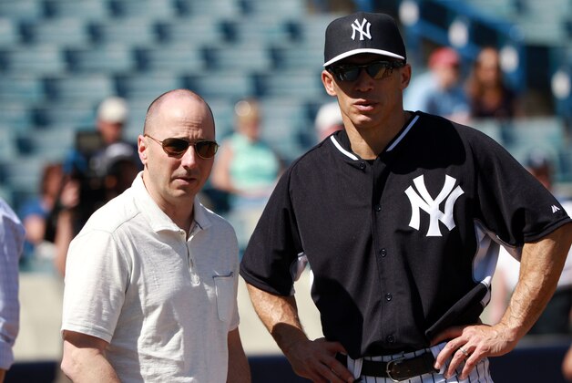 Feb 21, 2015; Tampa, FL, USA; New York Yankees manager Joe Girardi (right) and generial manager Brian Cashman during spring training workouts at George M. Steinbrenner Field. Mandatory Credit: Kim Klement-USA TODAY Sports