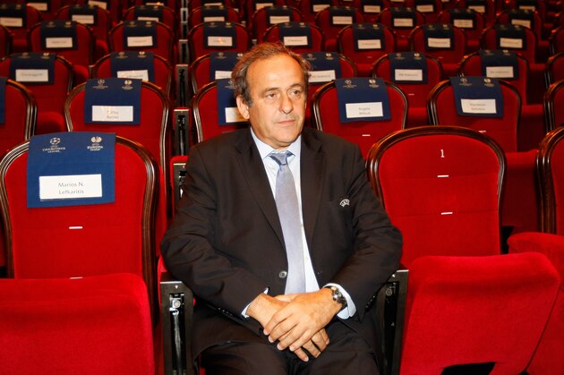FILE - In this Aug. 28, 2015 file photo UEFA President Michel Platini, attends the soccer Europa League draw ceremony at the Grimaldi Forum, in Monaco. Sepp Blatter and Michel Platini have been banned for 8 years, the FIFA ethics committee said Monday,  Dec. 21, 2015.  (AP Photo/Claude Paris, file)
