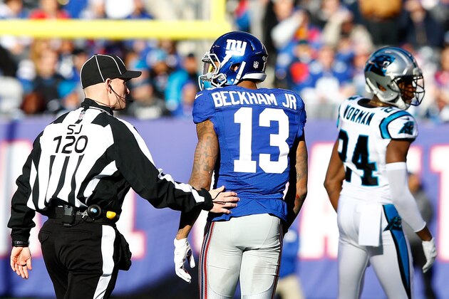 EAST RUTHERFORD, NJ - DECEMBER 20:   Odell Beckham #13 of the New York Giants talks with a referee after a play with Josh Norman #24 of the Carolina Panthers during their game at MetLife Stadium on December 20, 2015 in East Rutherford, New Jersey.  (Photo by Michael Reaves/Getty Images)