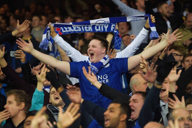 LIVERPOOL, ENGLAND - DECEMBER 19:  Leicester City supporters celebrate their team's 3-2 win in the Barclays Premier League match between Everton and Leicester City at Goodison Park on December 19, 2015 in Liverpool, England.  (Photo by Michael Regan/Getty Images)