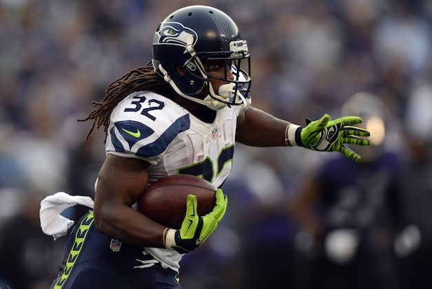 Dec 13, 2015; Baltimore, MD, USA;  Seattle Seahawks running back DuJuan Harris (32) rushes during the second half against the Baltimore Ravens at M&T Bank Stadium. Seattle Seahawks defeated Baltimore Ravens 35-6.  Mandatory Credit: Tommy Gilligan-USA TODAY Sports