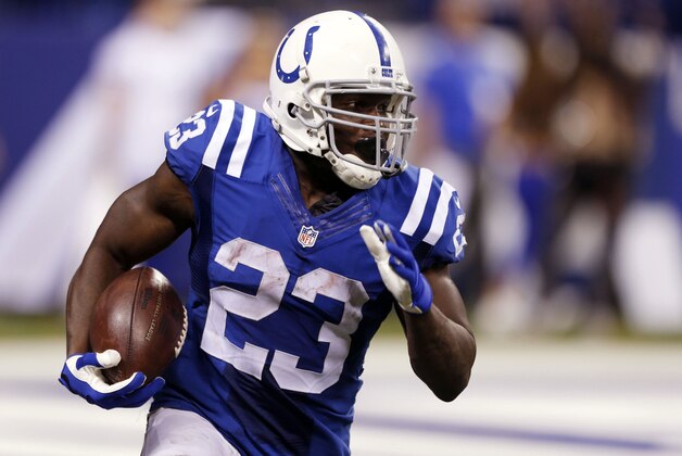 Sep 21, 2015; Indianapolis, IN, USA; Indianapolis Colts running back Frank Gore (23) runs with the ball against the New York Jets at Lucas Oil Stadium. New York Jets defeat the Indianapolis Colts 20-7. Mandatory Credit: Brian Spurlock-USA TODAY Sports