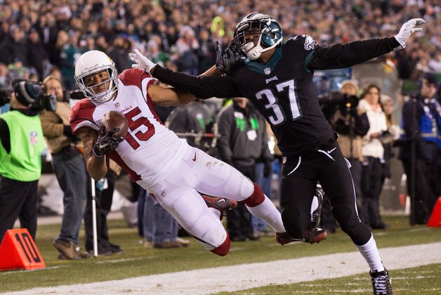 Dec 20, 2015; Philadelphia, PA, USA; Arizona Cardinals wide receiver Michael Floyd (15) makes a 29 yard reception at the one yard line past Philadelphia Eagles defensive back Jaylen Watkins (37) during the third quarter at Lincoln Financial Field. Mandatory Credit: Bill Streicher-USA TODAY Sports