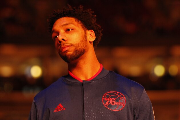 Philadelphia 76ers' Jahlil Okafor looks on during introductions prior to the first half of an NBA basketball game against the San Antonio Spurs, Monday, Dec. 7, 2015, in Philadelphia. The San Antonio Spurs won 119-68. (AP Photo/Chris Szagola)
