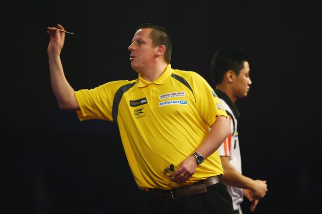 LONDON, ENGLAND - DECEMBER 22:  Dave Chisnall in action during his match against Rowby-John Rodrigues during the 2016 William Hill PDC World Darts Championships on Day Five at Alexandra Palace on December 22, 2015 in London, England.  (Photo by Ian Walton/Getty Images)