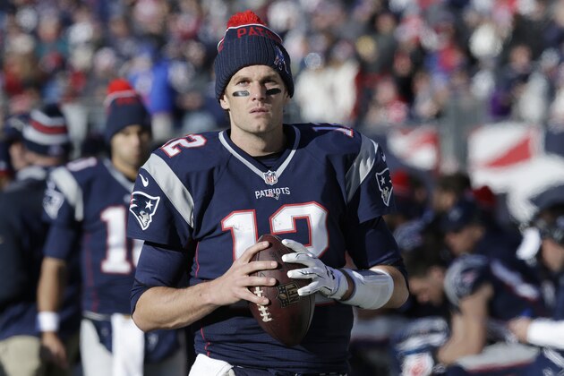 New England Patriots quarterback Tom Brady stands on the sideline in the first half of an NFL football game against the Tennessee Titans, Sunday, Dec. 20, 2015, in Foxborough, Mass. (AP Photo/Charles Krupa)