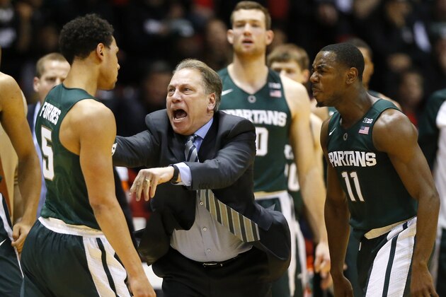 Michigan State head coach Tom Izzo shouts at Michigan State's Bryn Forbes (5) during the first half of an NCAA college basketball game against Northeastern in Boston Saturday, Dec. 19, 2015. (AP Photo/Winslow Townson)