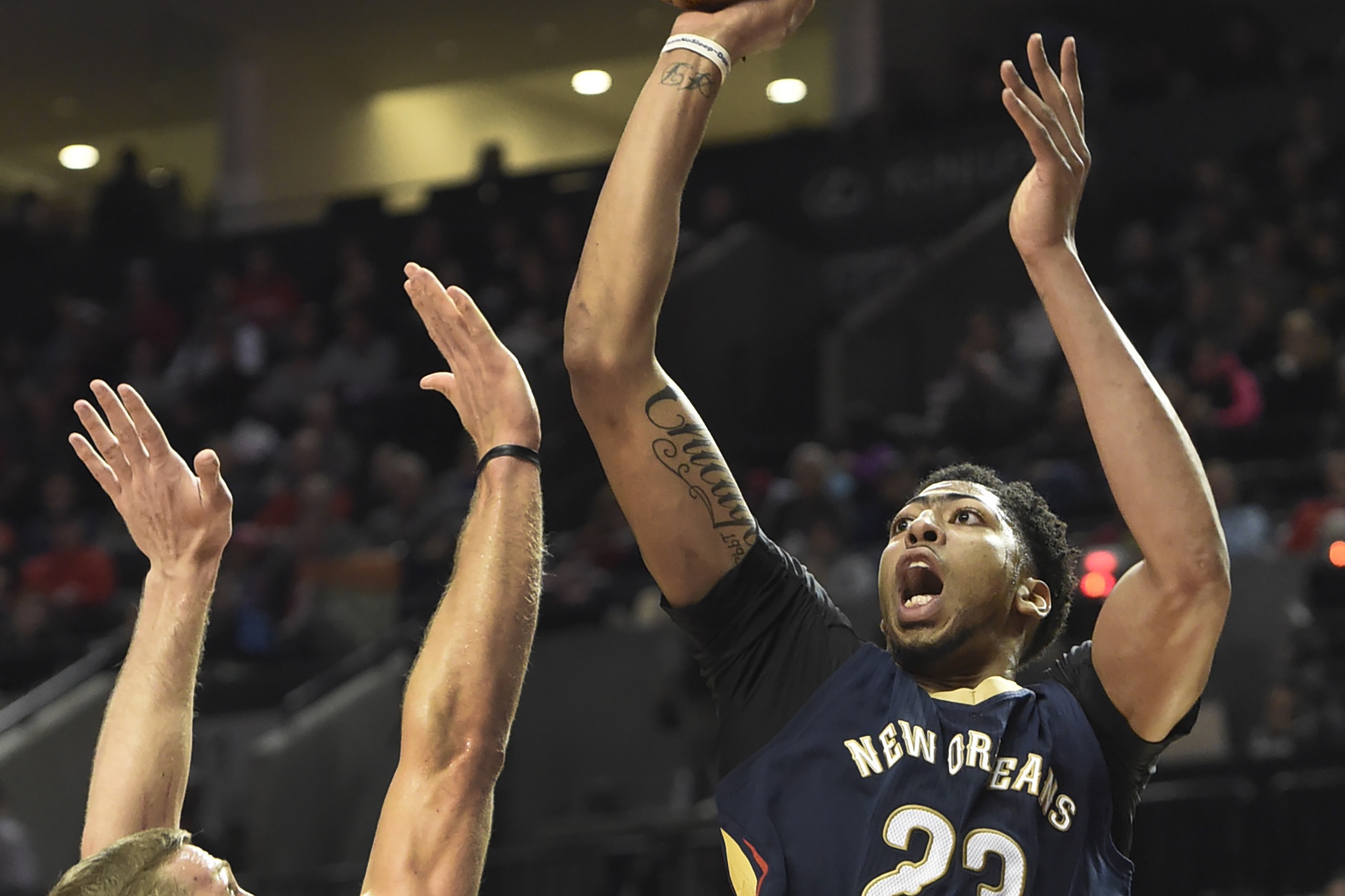 New Orleans Pelicans forward Anthony Davis (23) shoots over Portland Trail Blazers center Mason Plumlee (24) during the second half of an NBA basketball game in Portland, Ore., Monday, Dec. 14, 2015. The Trail Blazers won 105-101. (AP Photo/Steve Dykes) New Orleans Pelicans forward Anthony Davis (23) shoots over Portland Trail Blazers center Mason Plumlee (24) during the second half of an NBA basketball game in Portland, Ore., Monday, Dec. 14, 2015. The Trail Blazers won 105-101. (AP Photo/Steve Dykes)