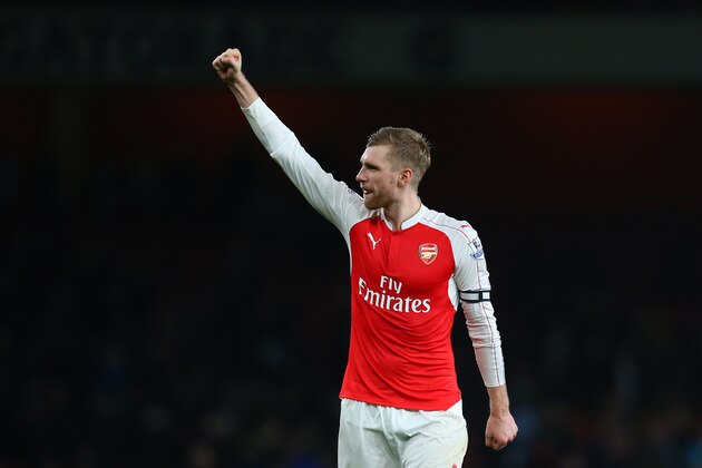 LONDON, ENGLAND - DECEMBER 21:  Per Mertesacker of Arsenal celebrates after the Barclays Premier League match between Arsenal and Manchester City at the Emirates Stadium on December 21, 2015 in London, England.  (Photo by Catherine Ivill - AMA/Getty Images)
