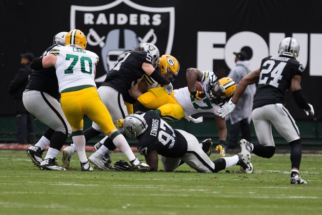 Dec 20, 2015; Oakland, CA, USA; Green Bay Packers running back Eddie Lacy (27) carries the ball against the Oakland Raiders during the first quarter at O.co Coliseum. Mandatory Credit: Kelley L Cox-USA TODAY Sports