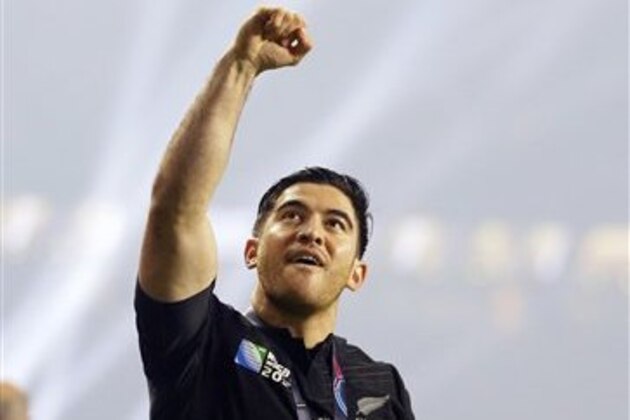 New Zealand's Nehe Milner-Skudder acknowledges the crowd after winning the Rugby World Cup final between New Zealand and Australia at Twickenham Stadium, London, Saturday, Oct. 31, 2015. New Zealand won the match 34-17. (AP Photo/Kirsty Wigglesworth)