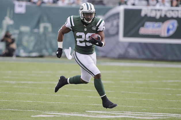 New York Jets running back Bilal Powell (29) rushes during the first half of an NFL football game against the Tennessee Titans Sunday, Dec. 13, 2015, in East Rutherford, N.J.  (AP Photo/Julie Jacobson)
