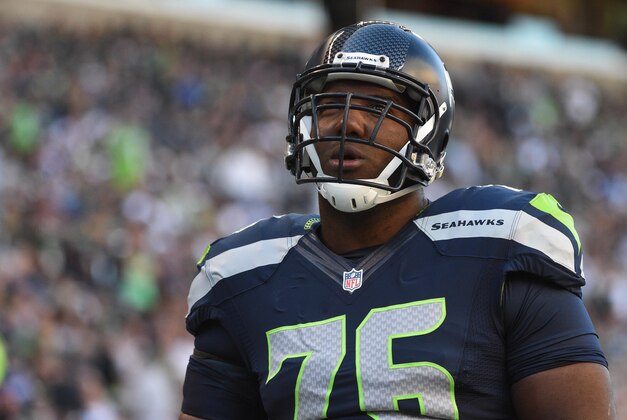 September 4, 2014; Seattle, WA, USA; Seattle Seahawks tackle Russell Okung (76) warms up before the game against the Green Bay Packers at CenturyLink Field. Mandatory Credit: Kyle Terada-USA TODAY Sports