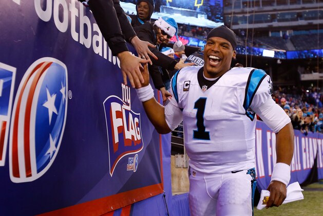EAST RUTHERFORD, NJ - DECEMBER 20:  Cam Newton #1 of the Carolina Panthers celebrates with fans after defeating the New York Giants in their game at MetLife Stadium on December 20, 2015 in East Rutherford, New Jersey.  The Carolina Panthers defeated the New York Giants with a score of 38 to 35.  (Photo by Michael Reaves/Getty Images)