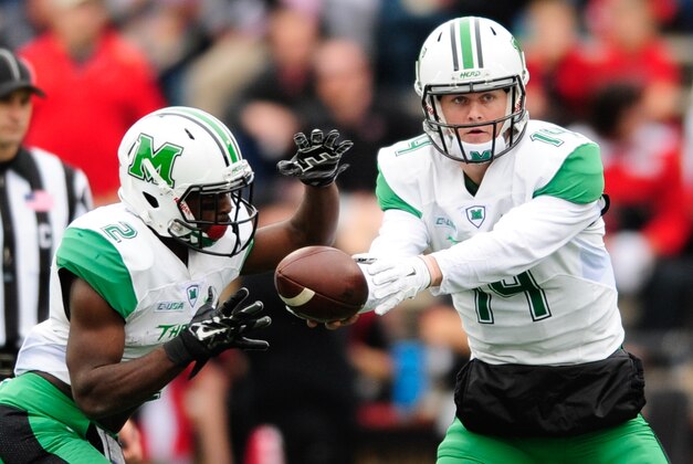 Nov 27, 2015; Bowling Green, KY, USA; (Caption Correction) Marshall Thundering Herd quarterback Chase Litton (14) hands the ball to wide receiver Hyleck Foster (2) during the first half agains Western Kentucky Hilltoppers at Houchens Industries-L.T. Smith Stadium. Mandatory Credit: Joshua Lindsey-USA TODAY Sports
