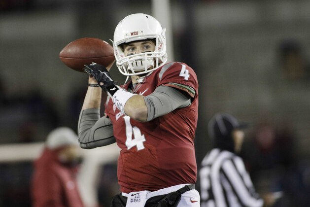 Washington State quarterback Luke Falk (4) warms up before an NCAA college football game, Saturday, Nov. 21, 2015, in Pullman, Wash. (AP Photo/Young Kwak)