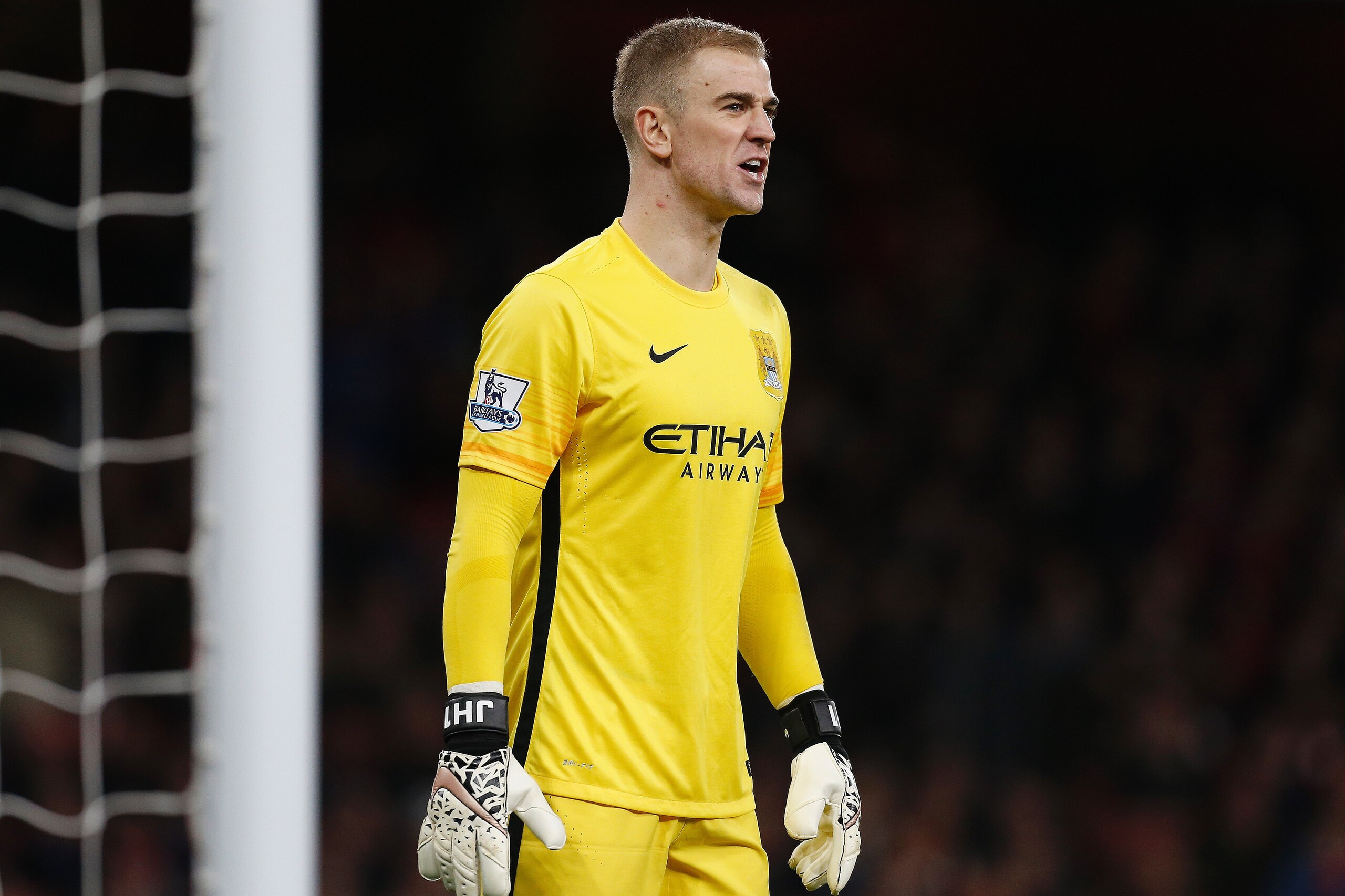 Manchester City's English goalkeeper Joe Hart shouts to his teammates during the English Premier League football match between Arsenal and Manchester City at the Emirates Stadium in London on December 21, 2015. AFP PHOTO / IKIMAGES

RESTRICTED TO EDITORIAL USE. No use with unauthorised audio, video, data, fixture lists, club/league logos or 'live' services. Online in-match use limited to 45 images, no video emulation. No use in betting, games or single club/league/player publications. / AFP / IKIMAGES / IKIMAGES        (Photo credit should read IKIMAGES/AFP/Getty Images)