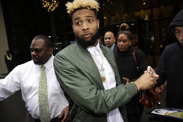 New York Giants’ Odell Beckham Jr. leaves NFL headquarters in New York, Wednesday, Dec. 23, 2015. Hearing officer James Thrash upheld the suspension for multiple violations of safety-related playing rules after hearing an appeal by the New York Giants wide receiver earlier in the day. Beckham will miss the game Sunday night at Minnesota. (AP Photo/Seth Wenig)