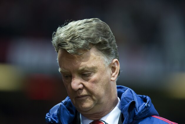 Manchester United's manager Louis van Gaal takes to the touchline before his team's English Premier League soccer match between Manchester United and Norwich City at Old Trafford Stadium, Manchester, England, Saturday, Dec. 19, 2015. (AP Photo/Jon Super)