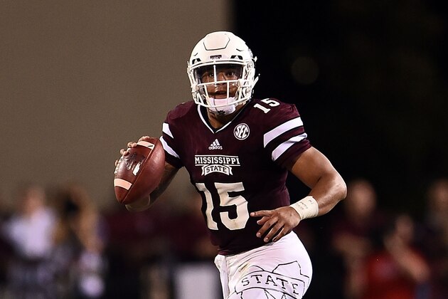 STARKVILLE, MS - NOVEMBER 28:  Dak Prescott #15 of the Mississippi State Bulldogs looks to pass during a game against the Mississippi Rebels at Davis Wade Stadium on November 28, 2015 in Starkville, Mississippi.  Mississippi defeated Mississippi State 38-27.  (Photo by Stacy Revere/Getty Images)