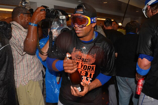 October 15, 2015; Los Angeles, CA, USA; New York Mets center fielder Yoenis Cespedes (52) celebrates the 3-2 victory against Los Angeles Dodgers in game five of NLDS at Dodger Stadium. Mandatory Credit: Jayne Kamin-Oncea-USA TODAY Sports