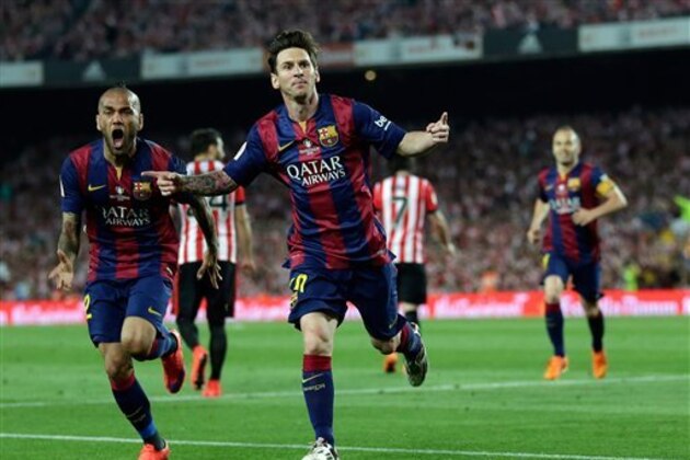 FILE - In this May 30, 2015 file photo, Barcelona's Lionel Messi, center, celebrates after scoring the opening goal during the final of the Copa del Rey soccer match between FC Barcelona and Athletic Bilbao at the Camp Nou stadium in Barcelona, Spain. Carli Lloyd and Lionel Messi are among the nominees for the FIFA Puskas Award for goal of the year. Lloyd scored for the United States from 50 yards against Japan in the Women’s World Cup final. Messi beat four defenders before scoring Barcelona’s first goal against Athletic Bilbao in the Copa del Rey final. (AP Photo/Manu Fernandez, File)