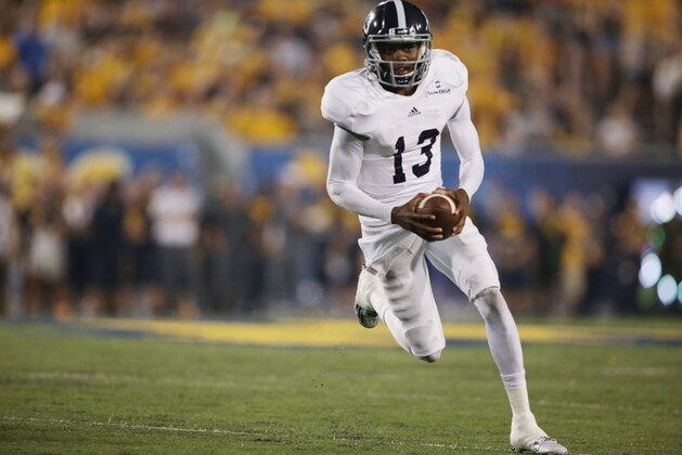 Georgia Southern quarterback Favian Upshaw (13)during a NCAA college football game, Saturday, Sept. 5, 2015, in Morgantown, W.Va. (AP Photo/Raymond Thompson)