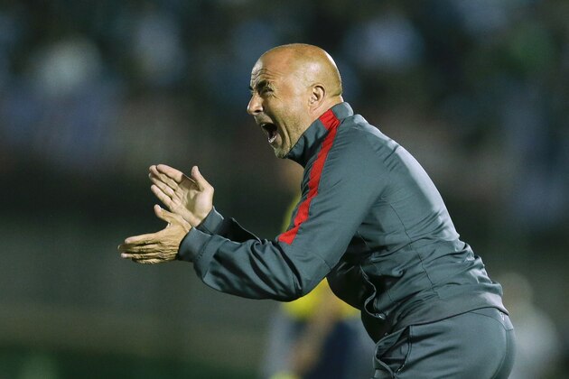 Chile's national soccer team coach Jorge Sampaoli reacts during a 2018 FIFA World Cup qualifying soccer match between Uruguay and Chile in Montevideo, Tuesday, Nov. 17, 2015. (AP Photo/Victor R. Caivano)
