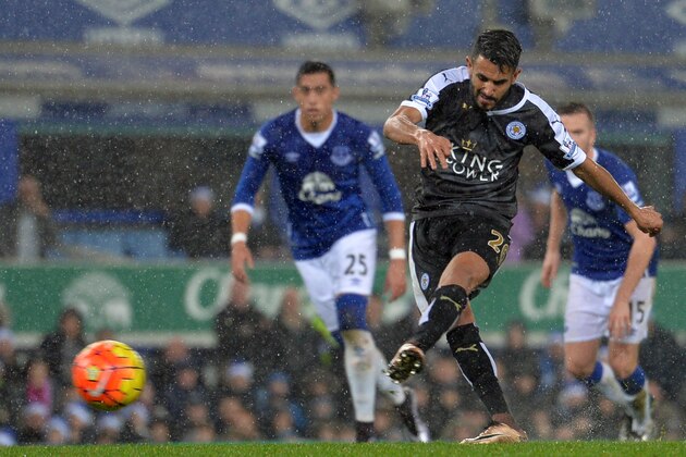Leicester City's Algerian midfielder Riyad Mahrez scores their second goal from the penalty spot during the English Premier League football match between Everton and Leicester City at Goodison Park in Liverpool, north west England on December 19, 2015. AFP PHOTO / PAUL ELLIS

RESTRICTED TO EDITORIAL USE. NO USE WITH UNAUTHORIZED AUDIO, VIDEO, DATA, FIXTURE LISTS, CLUB/LEAGUE LOGOS OR 'LIVE' SERVICES. ONLINE IN-MATCH USE LIMITED TO 75 IMAGES, NO VIDEO EMULATION. NO USE IN BETTING, GAMES OR SINGLE CLUB/LEAGUE/PLAYER PUBLICATIONS. / AFP / PAUL ELLIS        (Photo credit should read PAUL ELLIS/AFP/Getty Images)