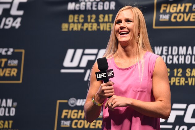 LAS VEGAS, NV - DECEMBER 11:   UFC women's bantamweight champion Holly Holm interacts with fans during a Q&A session before the UFC 194 weigh-in inside MGM Grand Garden Arena on December 10, 2015 in Las Vegas, Nevada.  (Photo by Josh Hedges/Zuffa LLC/Zuffa LLC via Getty Images)