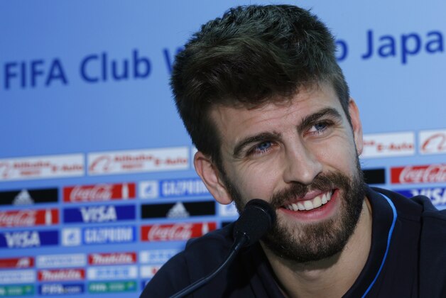 FC Barcelona’s Gerard Pique speaks during a press conference in Yokohama, near Tokyo, Wednesday, Dec. 16, 2015. The European champion club team of Spain will face against the Guangzhou Evergrande FC of China in the Club World Cup semi-final match in Yokohama Thursday, Dec. 17. (AP Photo/Shizuo Kambayashi)