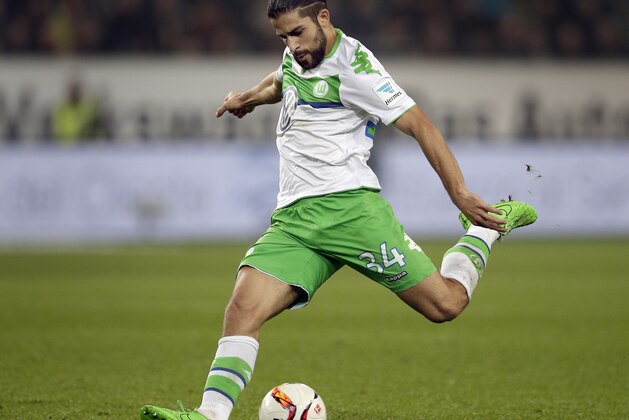 Wolfsburg's Ricardo Rodriguez plays the ball during the German Bundesliga soccer match between VfL Wolfsburg and and Bayer 04 Leverkusen in Wolfsburg, Germany, Saturday, Oct. 31, 2015. (AP Photo/Michael Sohn)