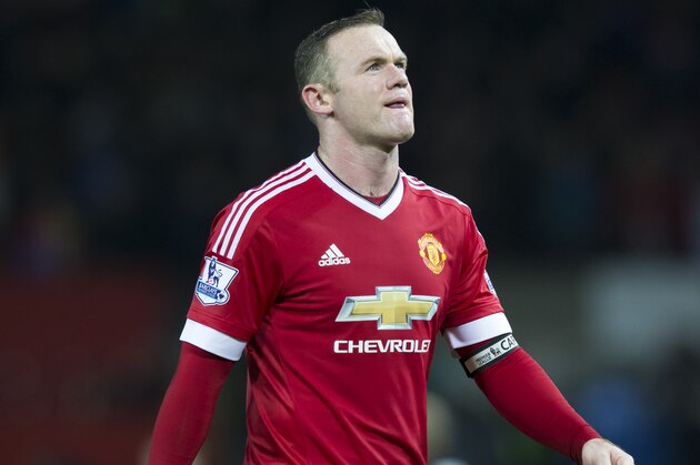 Manchester United's Wayne Rooney makes his way from the pitch after his team's 2-1 loss to Norwich City in the English Premier League soccer match between Manchester United and Norwich City at Old Trafford Stadium, Manchester, England, Saturday, Dec. 19, 2015. (AP Photo/Jon Super)