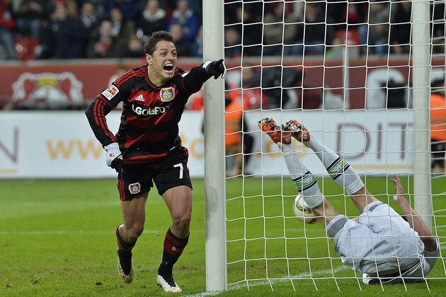 Leverkusen’s Javier Hernandez celebrates his third goal during the German Bundesliga soccer match between Bayer Leverkusen and Borussia Moenchengladbach in Leverkusen, Germany, Saturday, Dec. 12, 2015. Leverkusen defeated Moenchengladbach with 5-0, Hernandez scored three goals. (AP Photo/Martin Meissner)