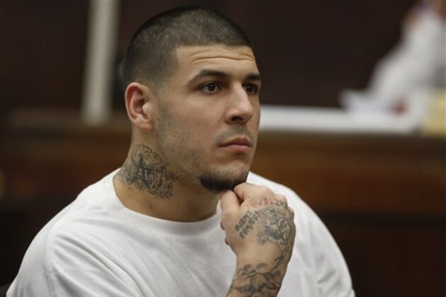 Former New England Patriots NFL football player Aaron Hernandez attends a pre-trial hearing at Suffolk Superior Court, Tuesday, Dec. 22, 2015, in Boston. Hernandez is charged with killing two Boston men in 2012 after a chance encounter at a nightclub. (AP Photo/Steven Senne, Pool)