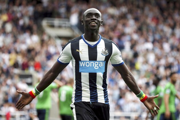 Newcastle United's Papiss Cisse celebrates his goal during their English Premier League soccer match between Newcastle United and Southampton at St James' Park, Newcastle, England, Sunday, Aug. 9, 2015. (AP Photo/Scott Heppell)