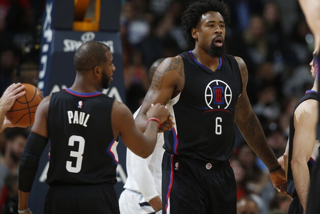 Los Angeles Clippers guard Chris Paul (3), left, congratulates Los Angeles Clippers center DeAndre Jordan (6) in the second half of an NBA basketball game Tuesday, Nov. 24, 2015, in Denver. The Clippers won 111-94. (AP Photo/David Zalubowski)