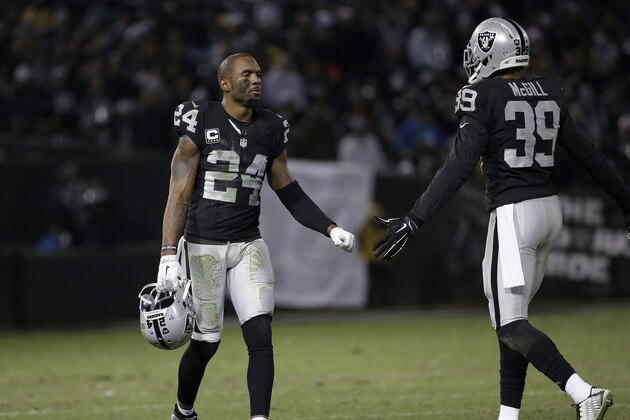 Oakland Raiders cornerback Charles Woodson (24) and cornerback Keith McGill (39) against the San Diego Chargers during the second half of an NFL football game in Oakland, Calif., Thursday, Dec. 24, 2015. (AP Photo/Marcio Jose Sanchez) Oakland Raiders cornerback Charles Woodson (24) and cornerback Keith McGill (39) against the San Diego Chargers during the second half of an NFL football game in Oakland, Calif., Thursday, Dec. 24, 2015. (AP Photo/Marcio Jose Sanchez)